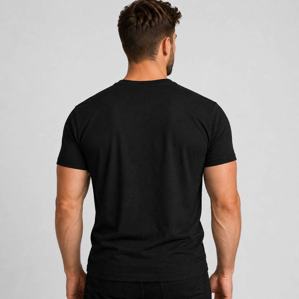 Man wearing a black t-shirt against a gray background
